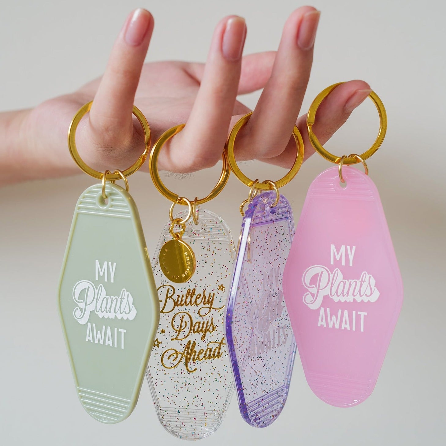 My Plants Await Motel Keychain