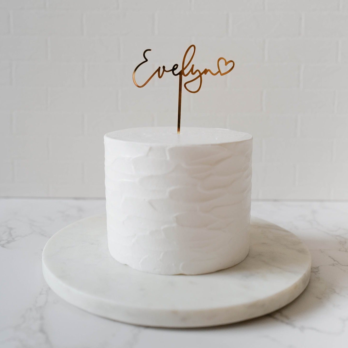 Name with a heart cake topper