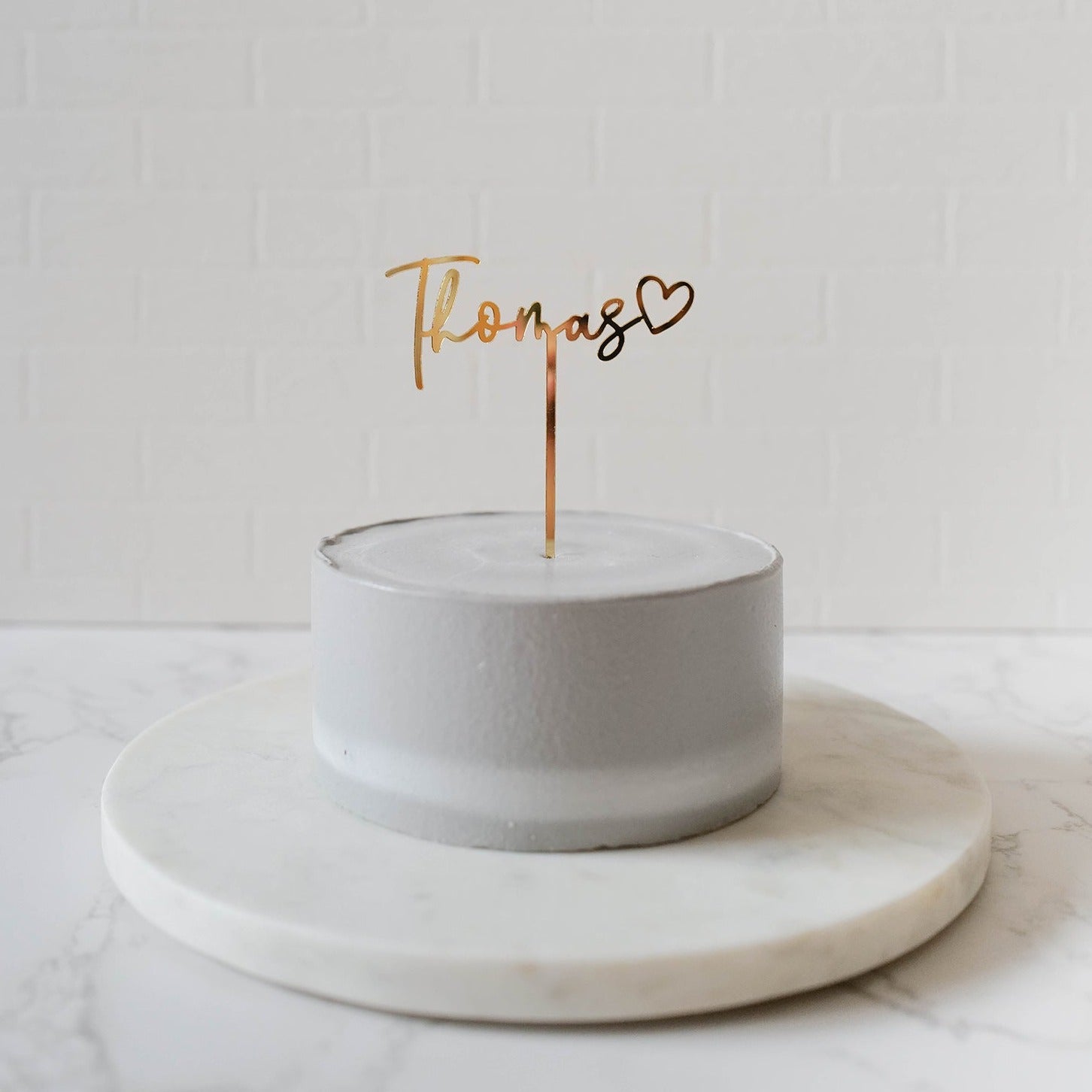 Name with a heart cake topper