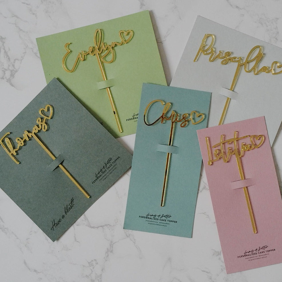 Name with a heart cake topper